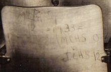 You can notice in the foreground it's written on the back of a chair that MCHS lost to North Jackson in 1933